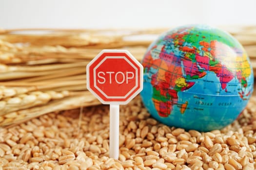 Bangkok, Thailand March 12, 2023 Wheat grains with stop sign, trade export and economy concept.