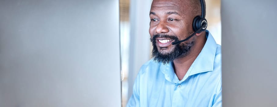 Call center, black man and communication at computer for customer service, CRM and contact us on mockup space. Banner, face and happy male agent at desktop pc for telemarketing, consulting or support.