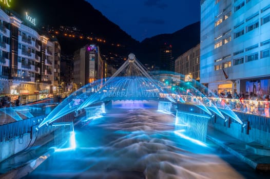 Andorra La Vella, Andorra : 2023 July 7 : Light and water show in the Capital of Andorra on the Valira River in Andorra La Vella in 2023.