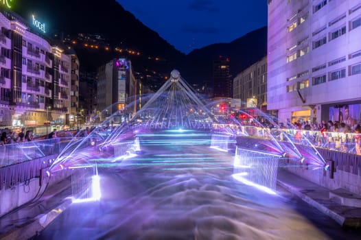 Andorra La Vella, Andorra : 2023 July 7 : Light and water show in the Capital of Andorra on the Valira River in Andorra La Vella in 2023.