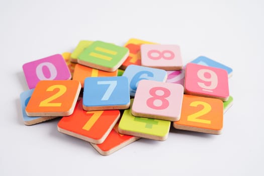 Number wood block cubes for learning Mathematic, education math concept.