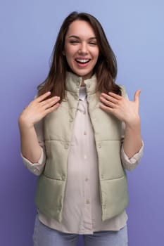 optimist 30s brunette young woman in casual look rejoices in victory.