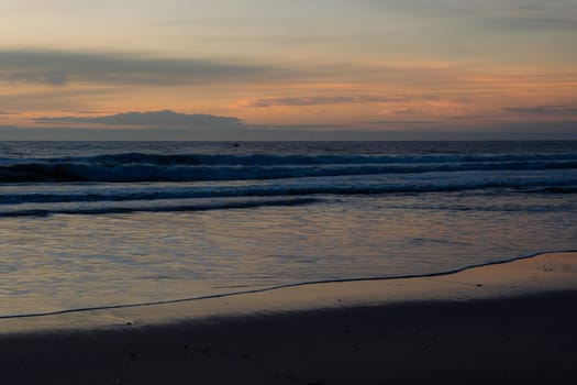 Affirmation photo You are free to be different Love yourself sunset over the sea horizon orange sky clouds dark sea water edge sand.