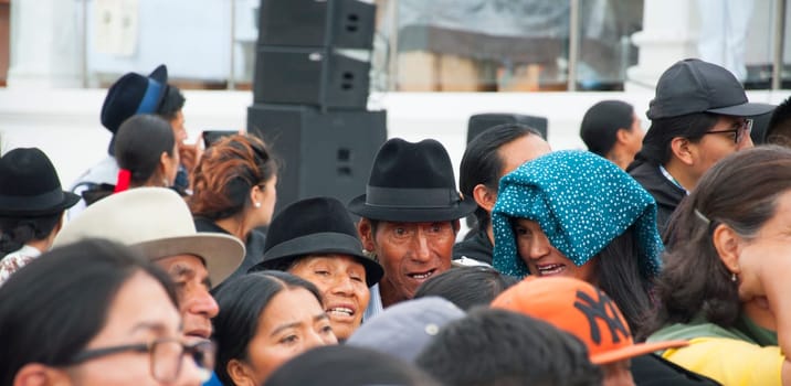 Otavalo, Ecuador - 24 de junio de 2023: indigenous woman from ecuador with black hat in the public act of the inti raymi of otavalo. High quality photo