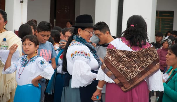Otavalo, Ecuador - 24 de junio de 2023: indigenous people celebrating the festival of inti raymi in ecuador in a square. High quality photo