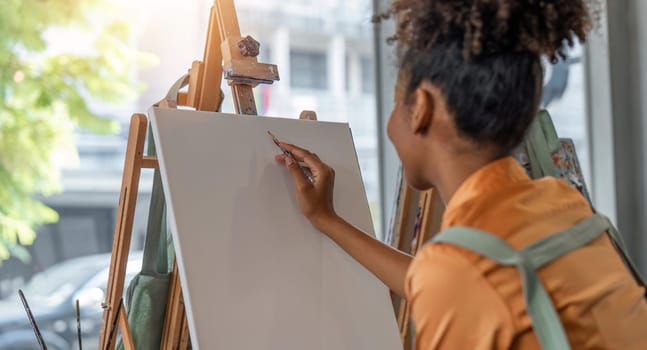 artist with pencil sketch picture at art studio.
