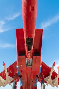 combat aircraft fighter bomber on a blue sky background. photo