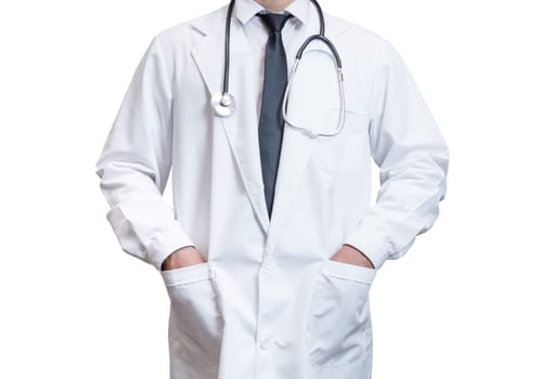 Doctor is standing and his hands in his lab coat on the white background. Medical concept. Medical information search concept. The concept of treating disease. Insurance concept.