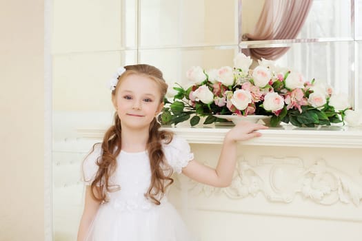 Image of smiling curly girl posing looking at camera