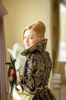 Image of pretty young actress posing in luxury dress