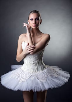 Portrait of beautiful sensual ballerina posing looking at camera