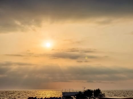 sunset at coast of the lake. Nature landscape. Nature in northern Europe. reflection, blue sky and yellow sunlight. landscape during sunset.