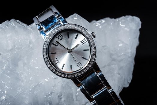 woman watch with diamond on black background