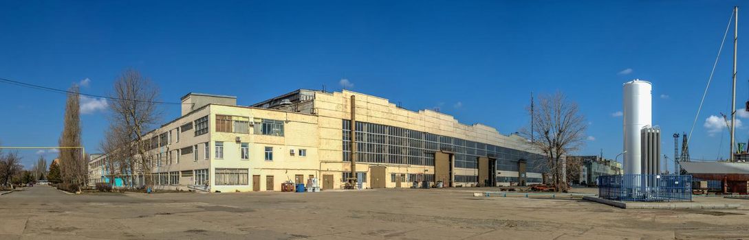 Chernomorsk, Ukraine. 21.03.2021. Factory workshops  of the Chernomorsk Shipyard on a sunny spring day