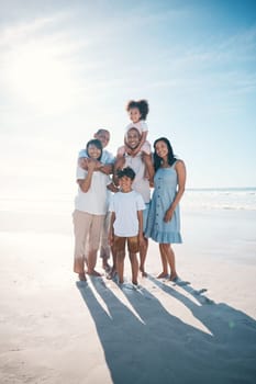 Vacation, beach and portrait of happy family together at the sea or ocean bonding for love, care and happiness. Happy, sun and parents with children or kids and grandparents on a holiday for freedom.