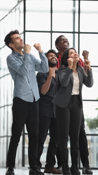 successful business team communicate in office corridor