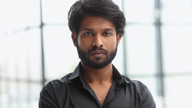 Proud confident bearded indian business man investor, rich ethnic ceo