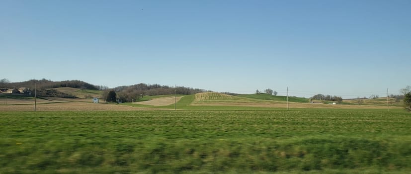 View of Rolling Green Hills and Blue Skies in Early Spring, Ohio