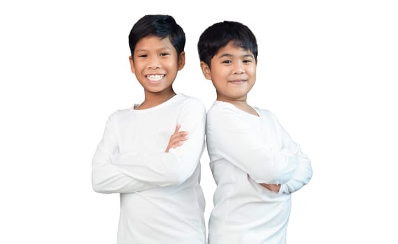 Brothers wearing white long-sleeved T-shirts smile and show joy together.