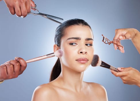 Brush, makeup and face of woman with doubt in studio for wellness, beauty and cosmetics on blue background. Cosmetology, salon and confused female person for application, foundation and products.