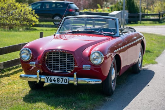 Gothenburg, Sweden - May 5, 2018 - The Volvo Sport (known as P1900) is a Swedish fiberglass-bodied roadster of which sixty-eight units were built. Parked on the grass, regular city roads