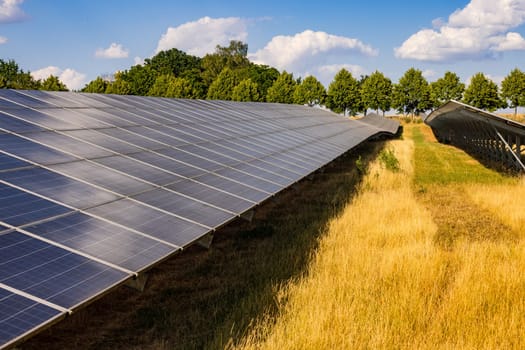 Many rows of solar panels of a solar power plant for the production of renewable electricity, Germany