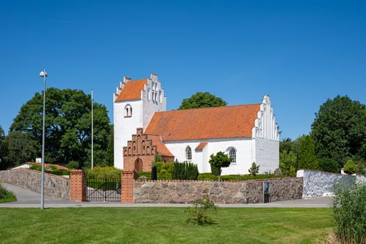 Hvedstrup, Denmark - July 9, 2023: Exterior of the church in Hvedstrup village in Roskilde municipality