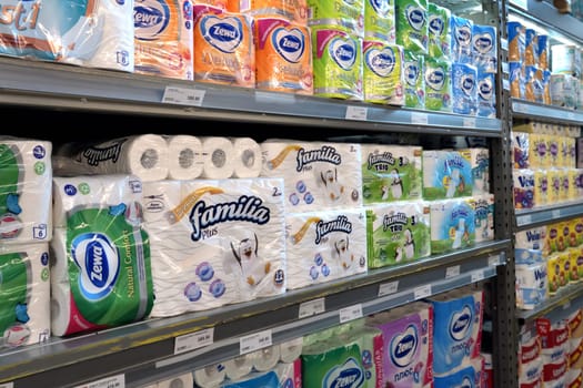 Moscow, Russia - July 10. 2023. Different toilet paper on a shelf in Selgros Cash and Carry shop