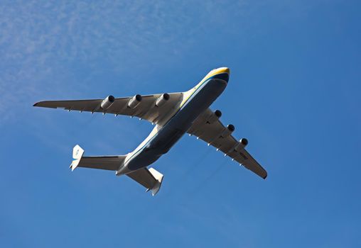 KYIV, UKRAINE - Aug 24, 2021: Celebrating the 30th anniversary of Ukraine independence. The plane Antonov 225 AN-225 Mriya, the biggest airplane in the world in the sky over Kyiv during the parade