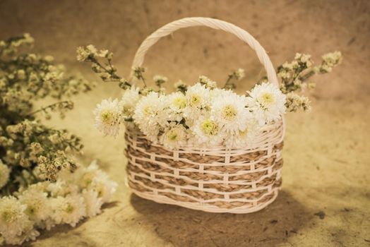 white flowers on basket vintage