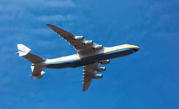 KYIV, UKRAINE - Aug 24, 2021: Celebrating the 30th anniversary of Ukraine independence. The plane Antonov 225 AN-225 Mriya, the biggest airplane in the world in the sky over Kyiv during the parade