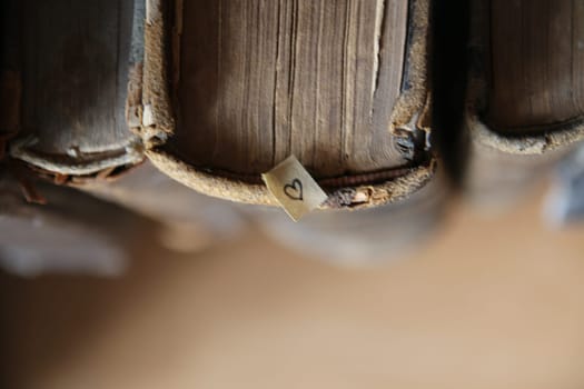 Happy Birthday background. Old books on a wooden shelf.