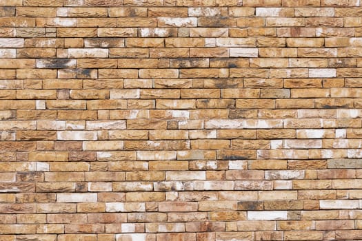 Background of modern yellow brick wall texture, abstract stone surface, High quality photo