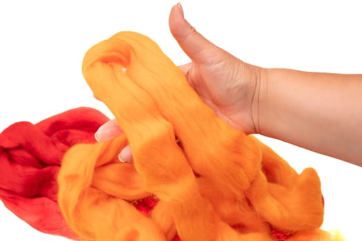 Close-up of merino wool for felting in hand