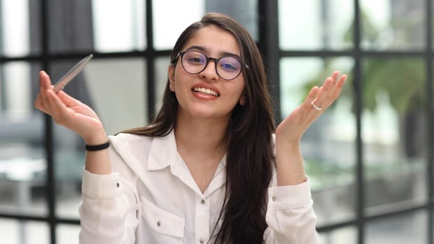 Portrait woman in office, happiness and online research for small business administration.