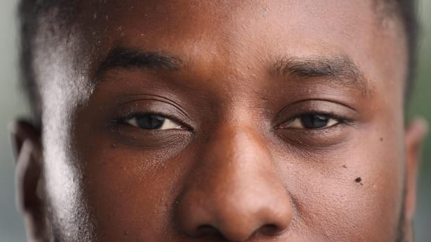 Close up shot of young african american black man with closed eyes. High quality photo