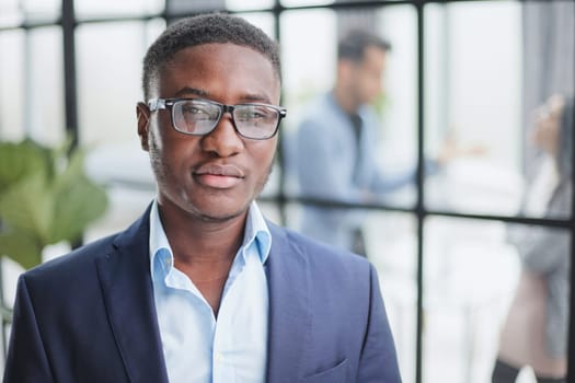 Mature african american executive businessman at workspace.
