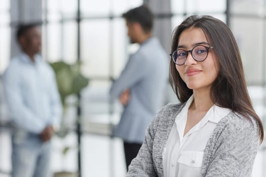 Portrait of girl leader or manager at a team planning, collaboration and strategy business meeting.