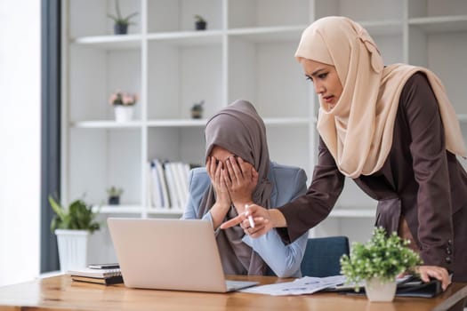 Professional Muslim business team working together, discussing on an important project in the office room...