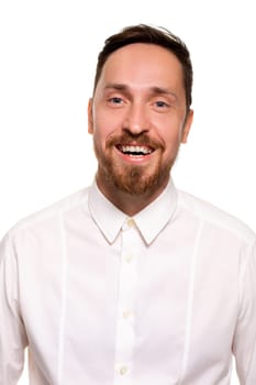 Stylish bearded business man smiling to camera, having pleased expression and cheerful look. Positive emotions concept.