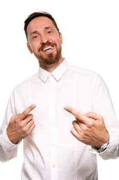 Stylish bearded business man smiling to camera, having pleased expression and cheerful look. Positive emotions concept.