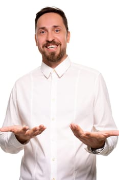 Stylish bearded business man smiling to camera, having pleased expression and cheerful look. Positive emotions concept.