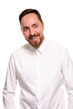 Stylish bearded business man smiling to camera, having pleased expression and cheerful look. Positive emotions concept.