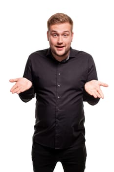 Bearded man smiling and spreading hands don't know what to say in answer. Body language. Emotional portrait on a white background