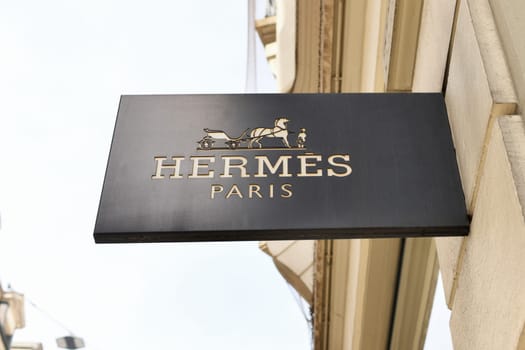 Lausanne, Switzerland - August 24 ,2022 : Signboard at the luxury store Hermess with logo