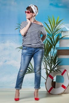 Happy middle-aged model posing in sailor's style
