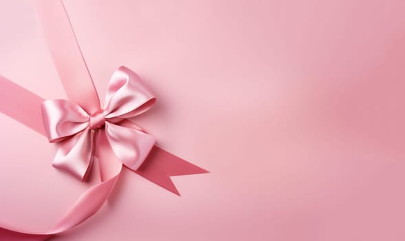 Pink ribbon with bow isolated on pastel pink background, simple double tied bow and horizontal ribbon for decoration gift box or greeting card or voucher banner, flat lay close up top view copy space top view