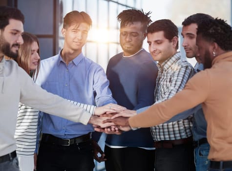 Business professionals welcome a new participant to the seminar