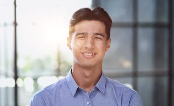 Portrait of a successful Asian businessman, in a modern office building