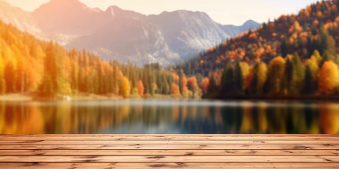 The empty wooden table top with blur background of lake and mountain in autumn. Exuberant image.